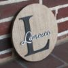 Picture of Personalized Round Raised Letter Family Name Sign